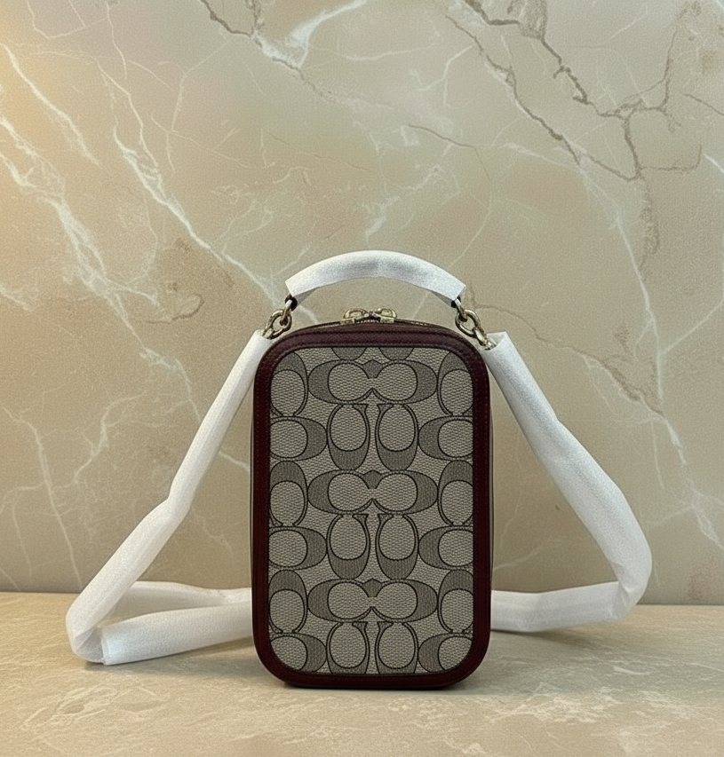 حقيبة كروسبودي للهاتف من كوتش آلي مصنوعة من قماش الجاكار المميز - خشب البلوط والقيقب (متوفرة في متجر بوتيك فرنسي)