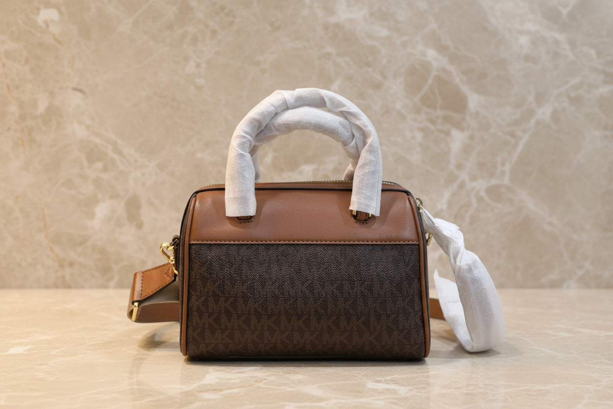 MICHAEL KORS XS TRAVEL DUFFLE CROSSBODY IN SIGNATURE BROWN