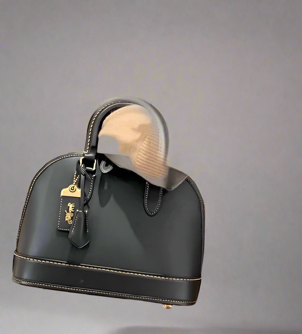 COACH REVEL 24 - GLOVETANNED LEATHER