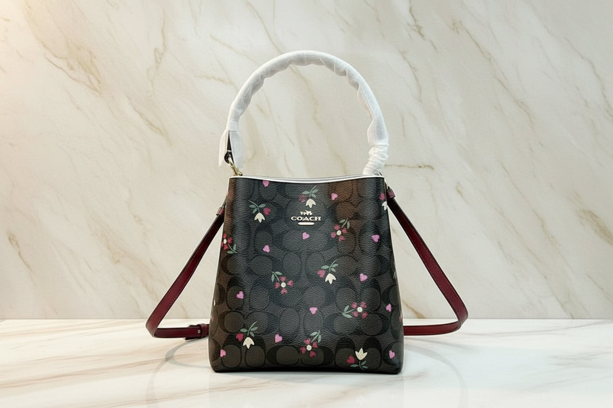 COACH SMALL TOWN BUCKET IN SIGNATURE CANVAS WITH HEART PETAL PRINT