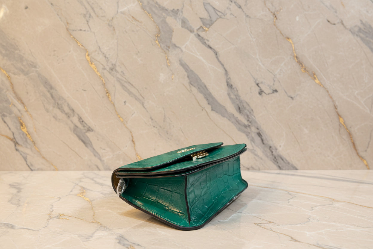 حقيبة كروسبودي كوتش برين ذات غطاء قلاب - لون اليشم