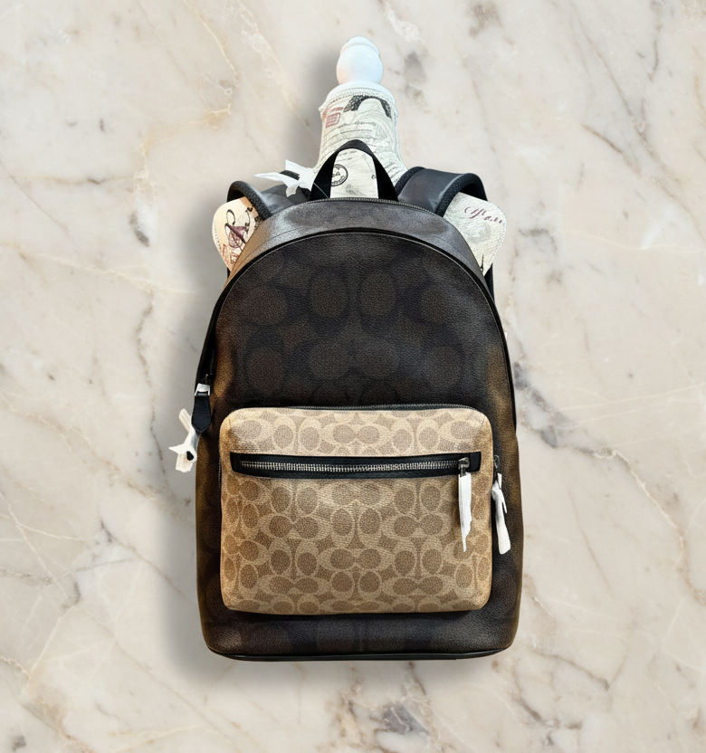 COACH MEN’S WEST BACKPACK IN BLOCKED SIGNATURE CANVAS