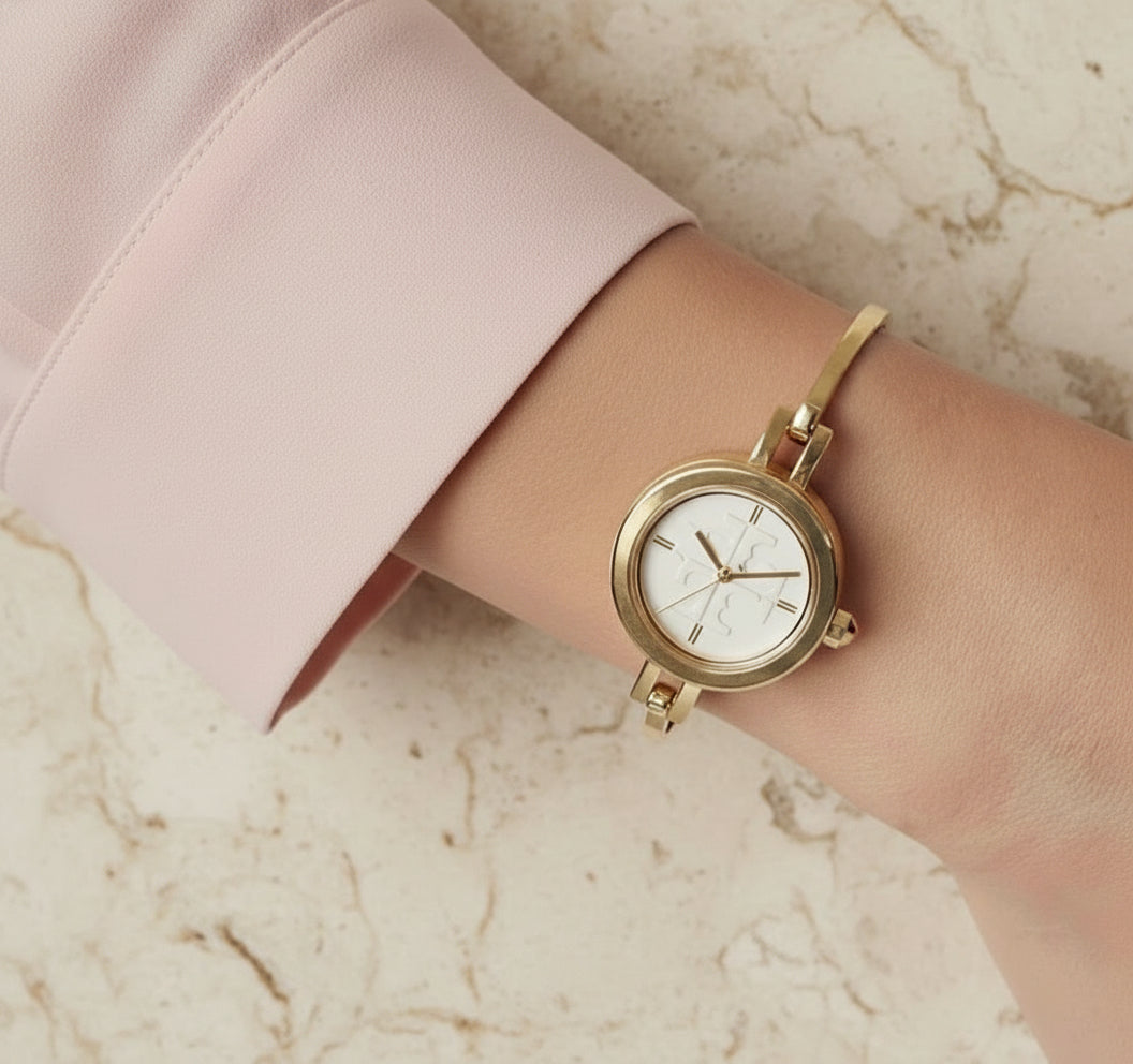 ساعة توري بورش الصغيرة ذات الأزرار القابلة للتبديل