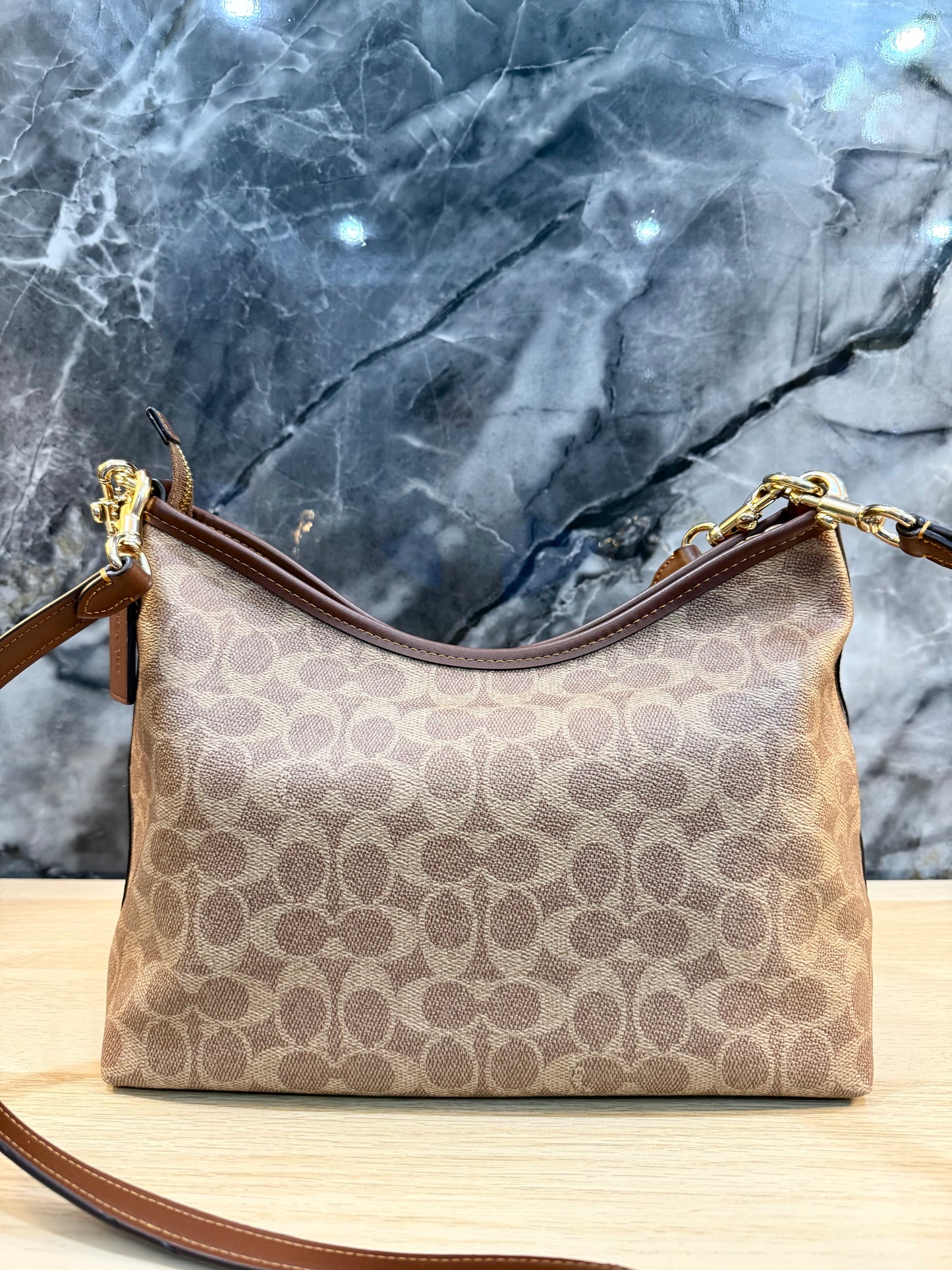 COACH MEDIUM LAUREL SIGNATURE COATED CANVAS