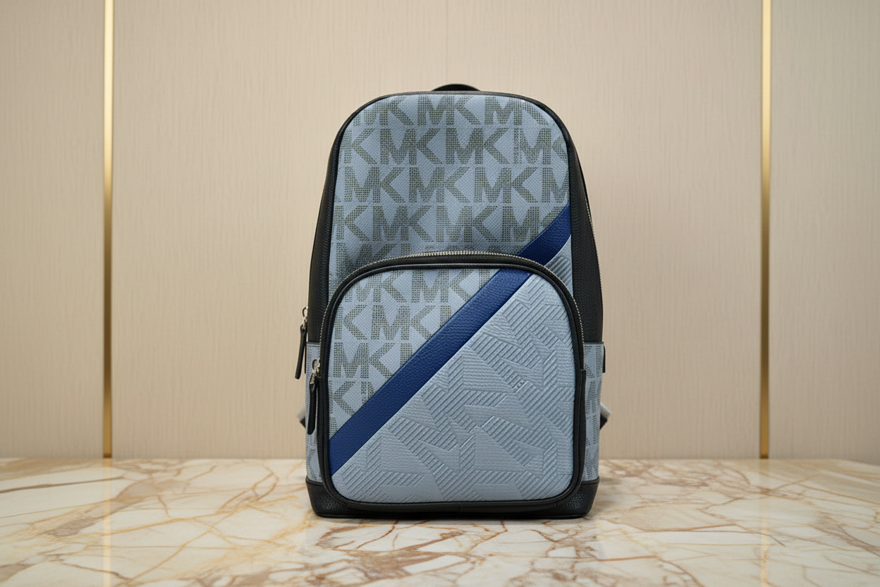 MICHAEL KORS COOPER COMMUTER SLINGPACK CHAMBRAY