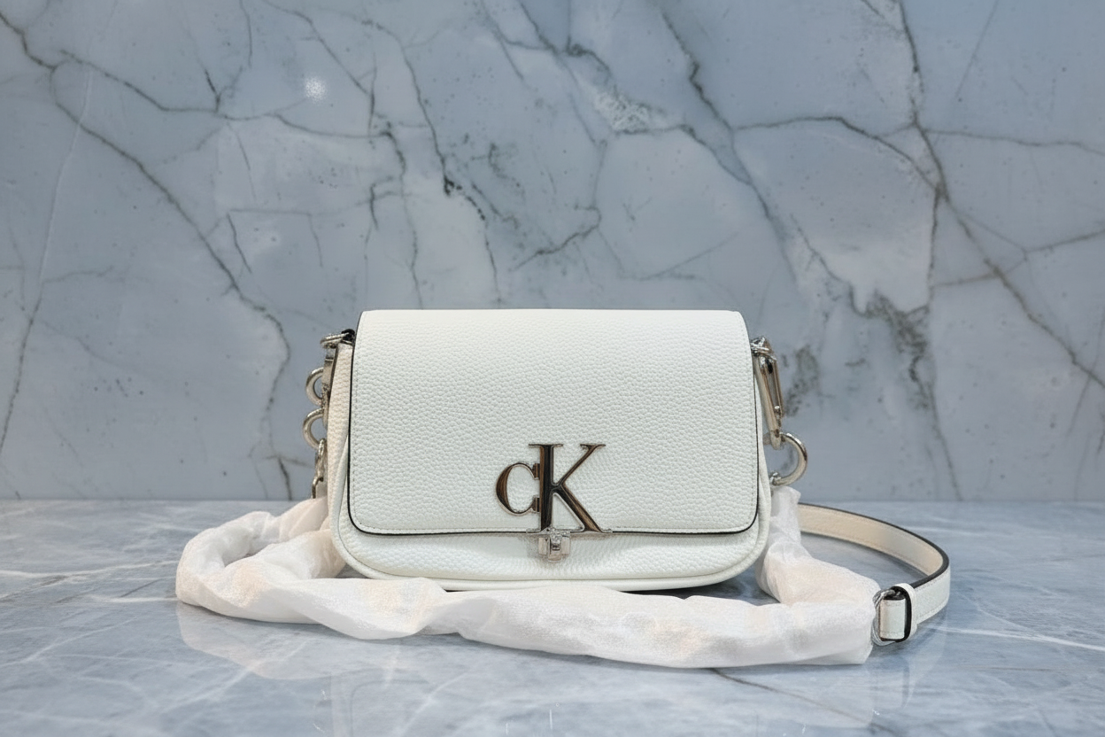 CALVIN KLEIN CHAIN CROSSBODY BAG - SILVER BIRCH