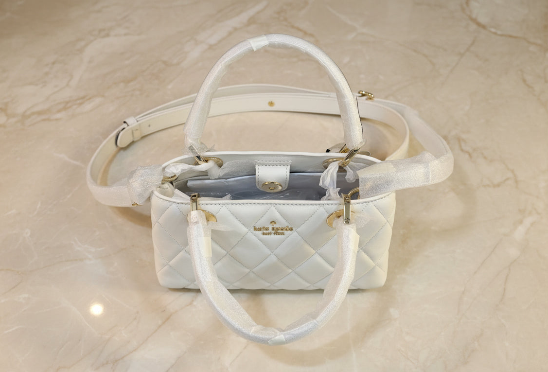 حقيبة كيت سبيد كاري المبطنة الصغيرة - بيضاء