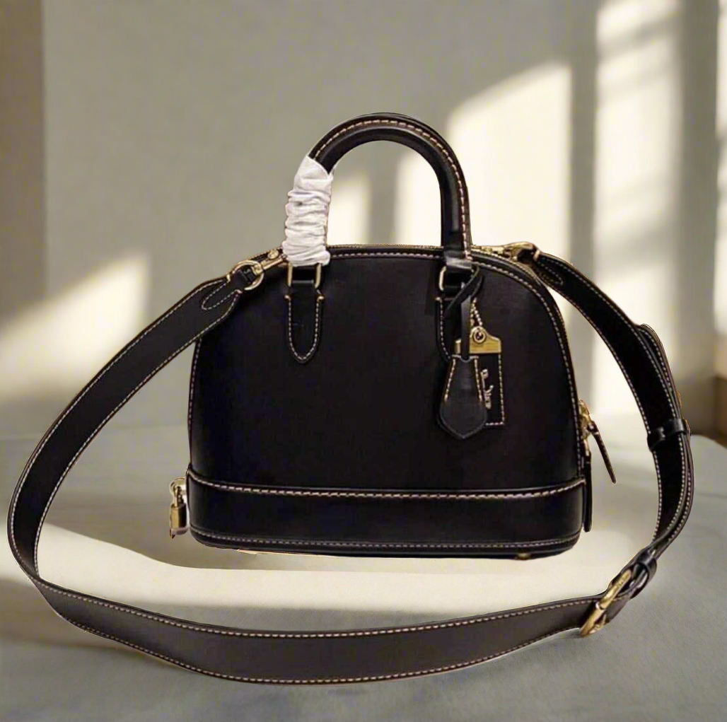 COACH REVEL 24 - GLOVETANNED LEATHER
