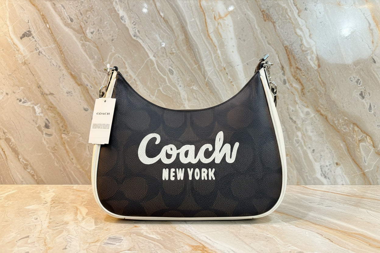 حقيبة كتف/حقيبة كروس بودي من كوتش سكريبت تيري هوبو - متوسطة الحجم