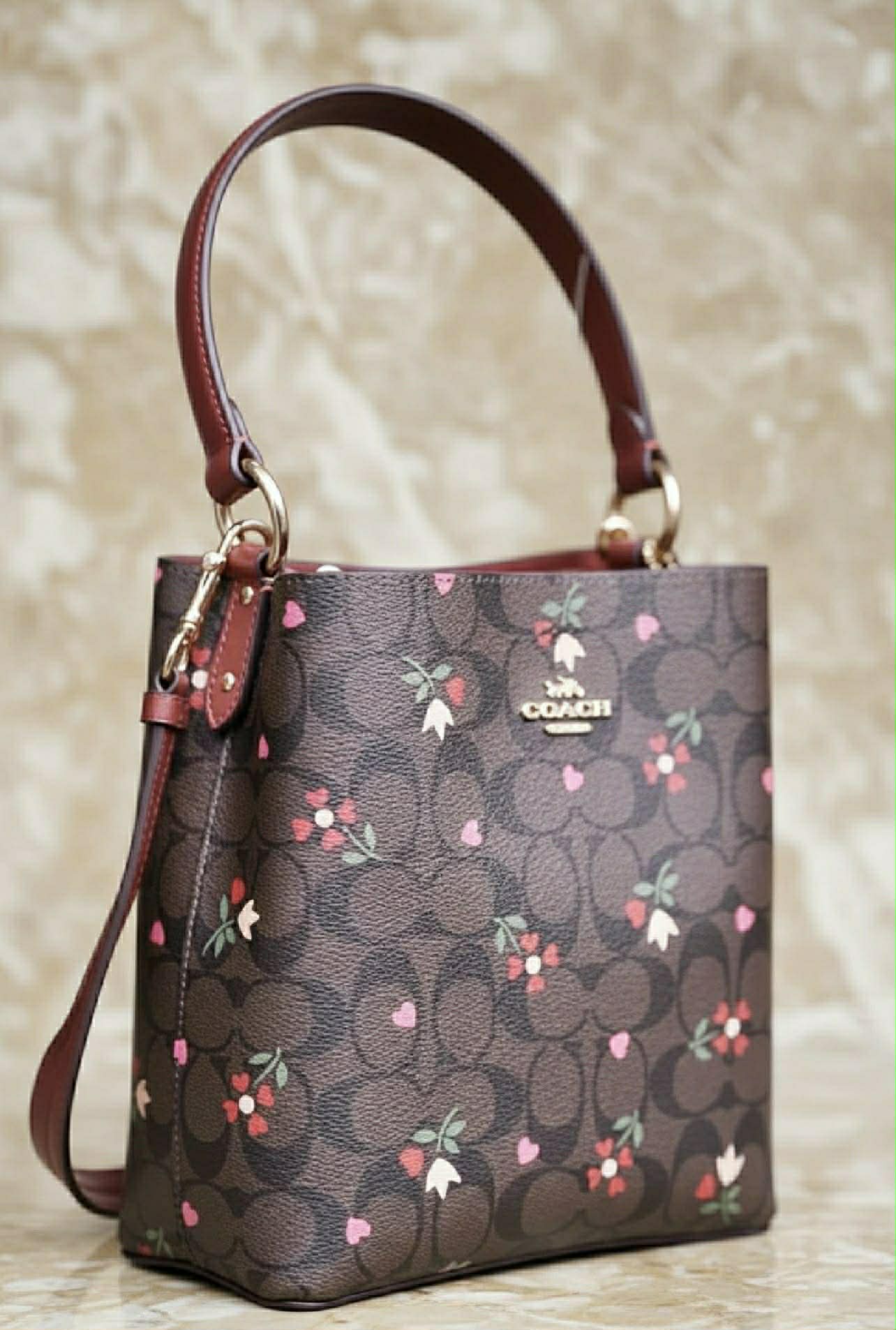 COACH SMALL TOWN BUCKET IN SIGNATURE CANVAS WITH HEART PETAL PRINT