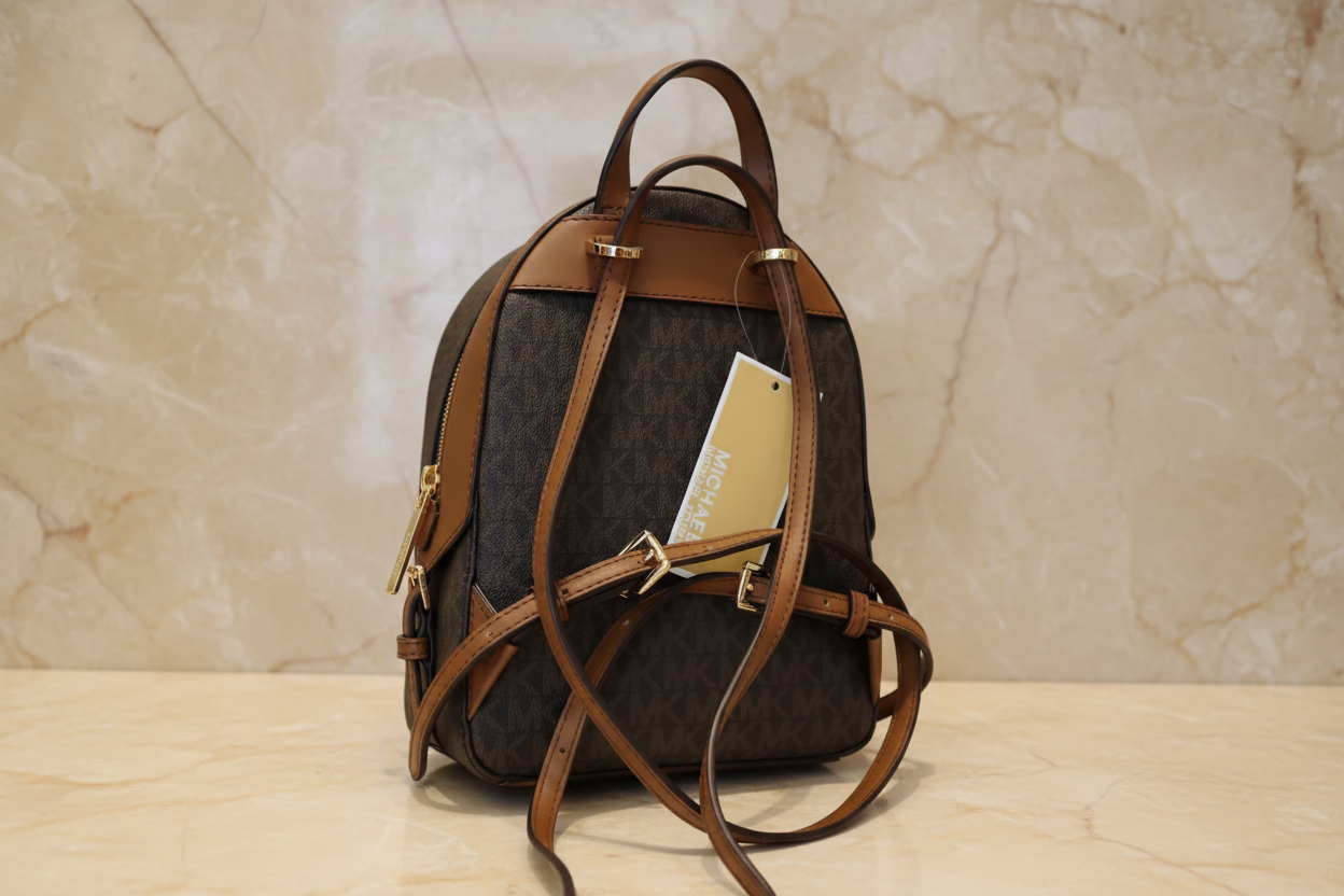 حقيبة ظهر مايكل كورس جايسي مقاس XS، لون بني مميز