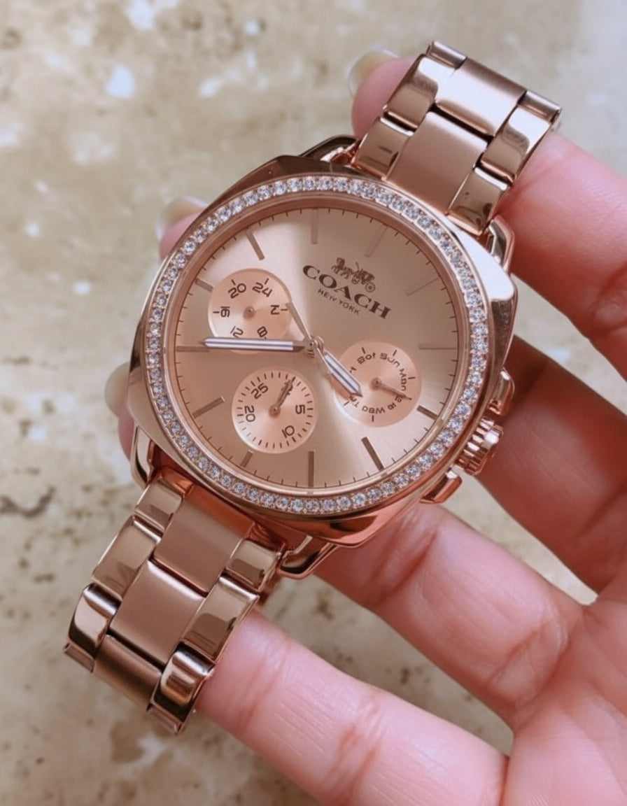 ساعة كوتش ذات وجه كبير - مطلية بالذهب الوردي والفولاذ المقاوم للصدأ