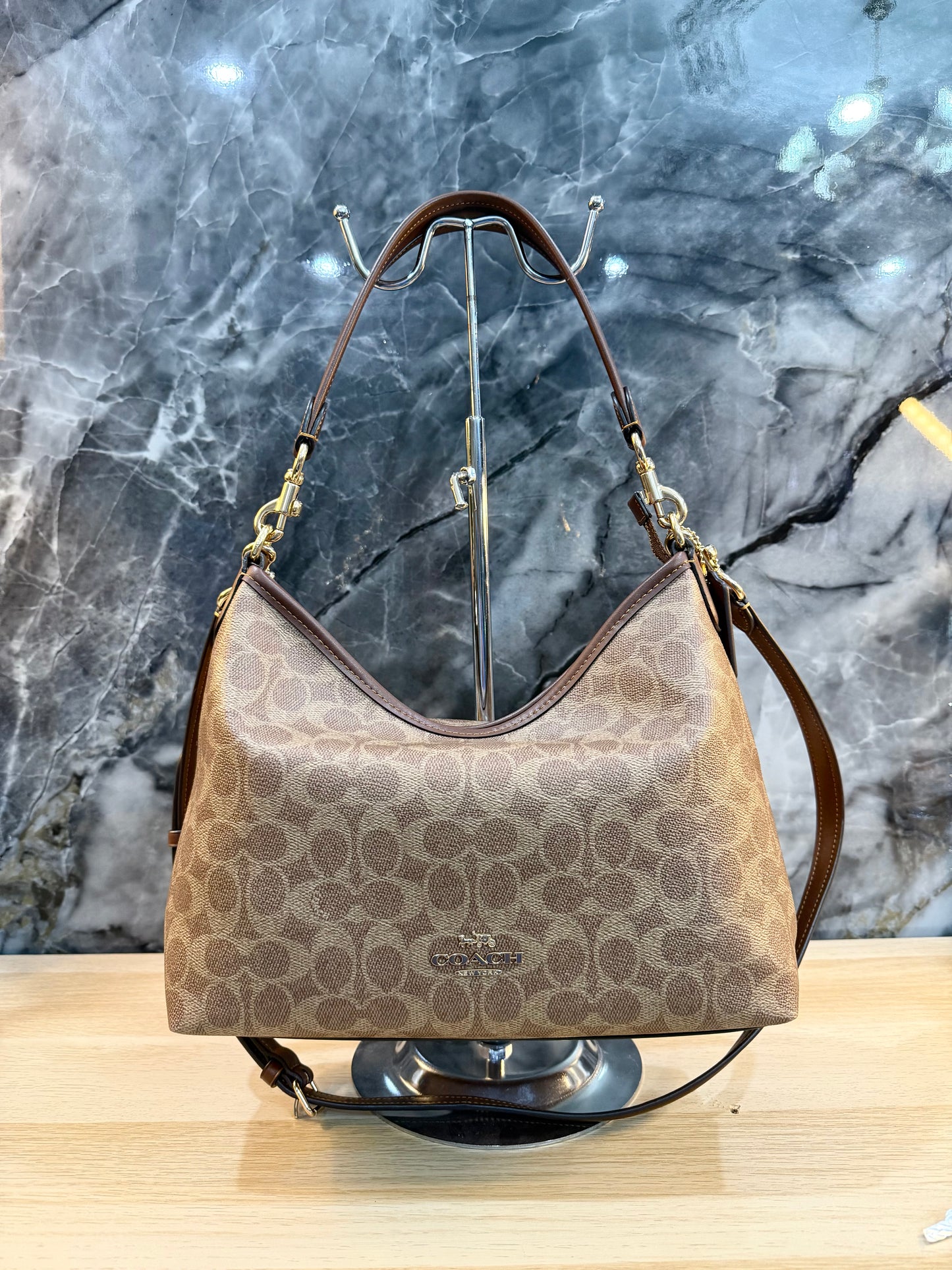 COACH MEDIUM LAUREL SIGNATURE COATED CANVAS