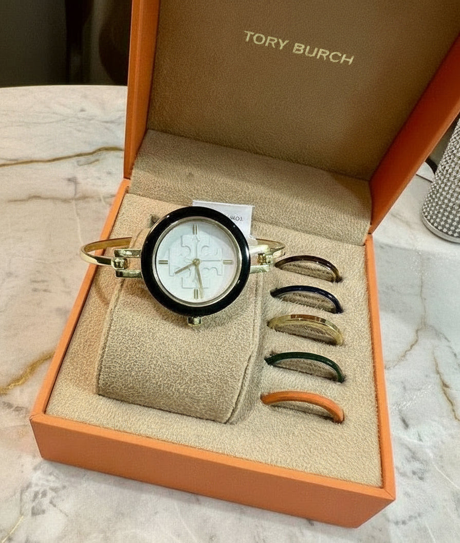 ساعة توري بورش الصغيرة ذات الأزرار القابلة للتبديل