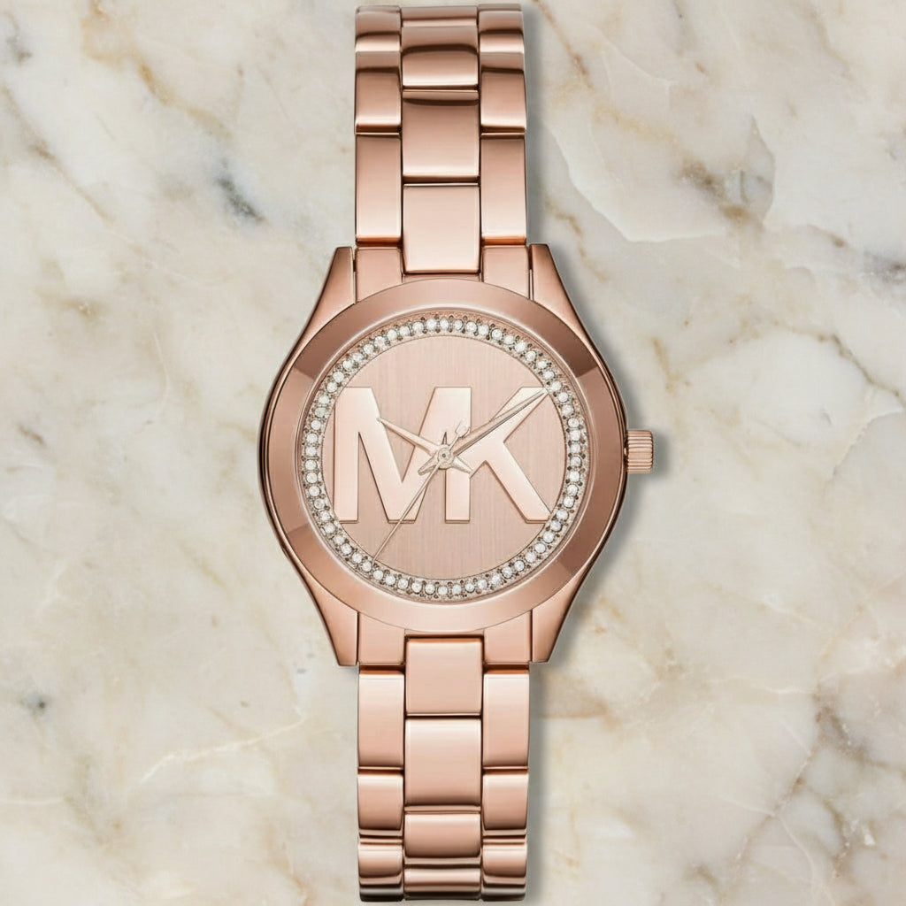 ساعة مايكل كورس ميني سليم رانوي - لون ذهبي وردي - بشعار MK وتصميم مرصع بالكريستال - علبة ساعة مجانية 