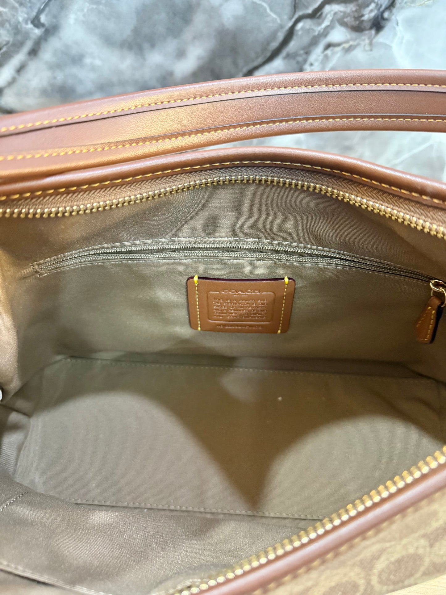 COACH MEDIUM LAUREL SIGNATURE COATED CANVAS