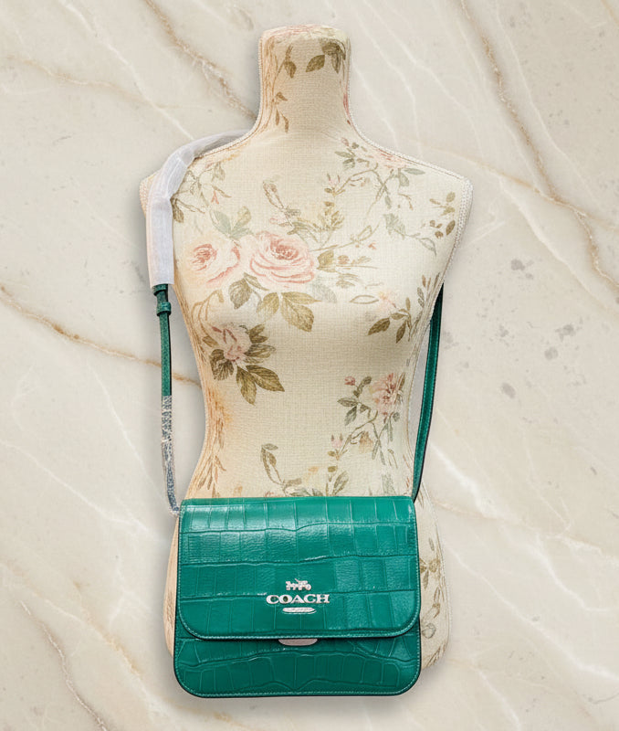 حقيبة كروسبودي كوتش برين ذات غطاء قلاب - لون اليشم