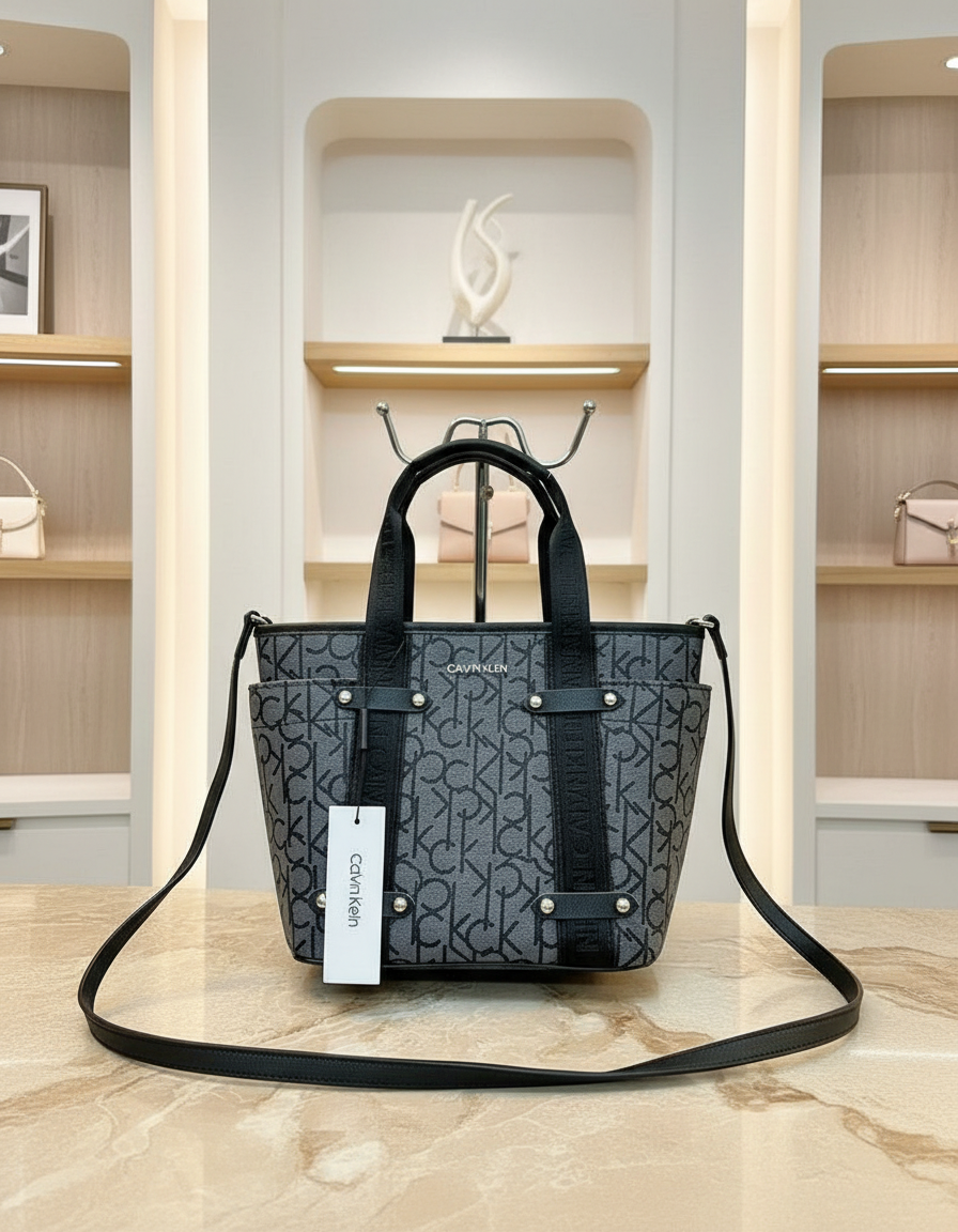 CALVIN KLEIN SATCHEL IN SIGNATURE CHARCOAL BLACK