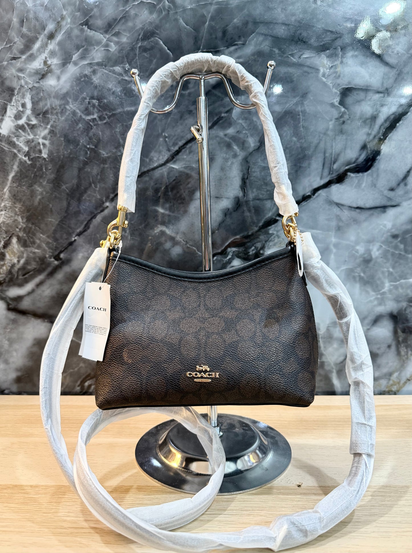 COACH SMALL LAUREL SIGNATURE COATED CANVAS