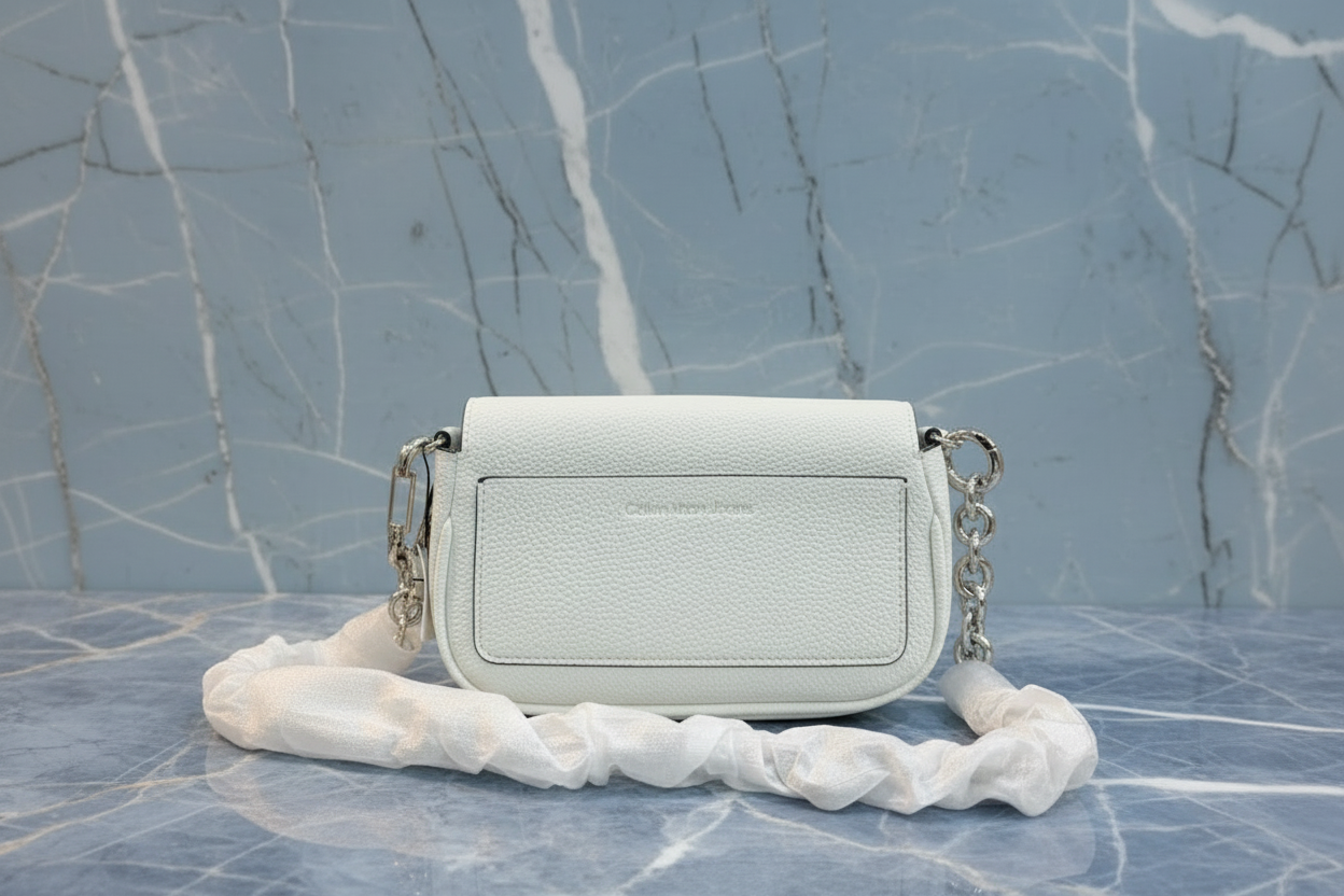 CALVIN KLEIN CHAIN CROSSBODY BAG - SILVER BIRCH