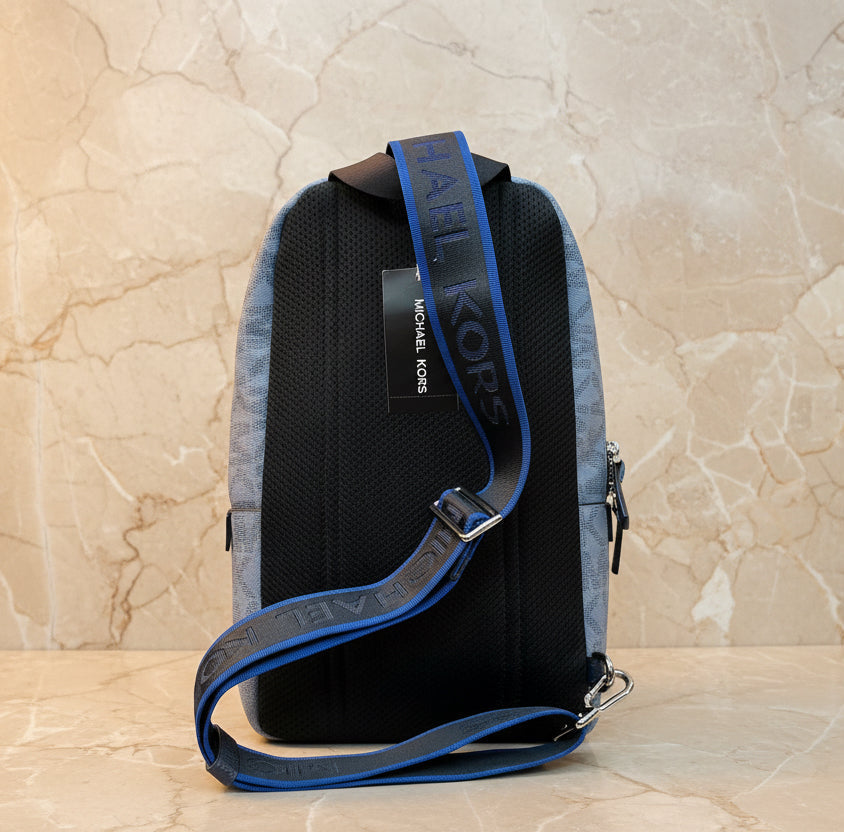 MICHAEL KORS COOPER COMMUTER SLINGPACK CHAMBRAY