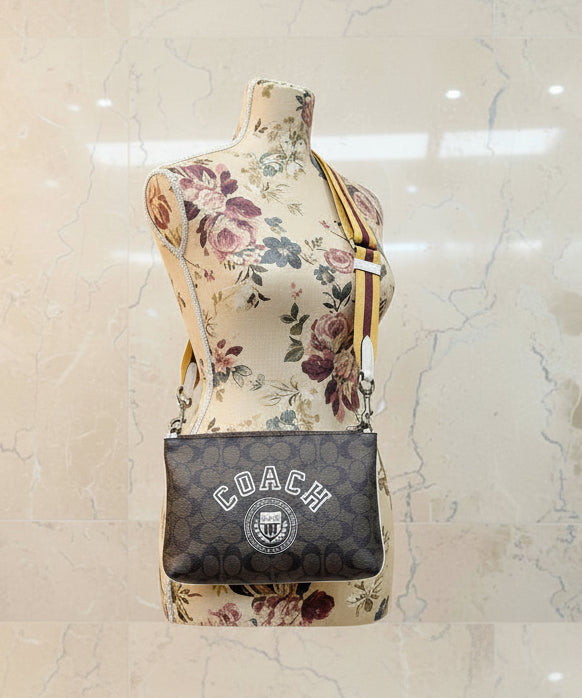 COACH EVERETTE CROSSBODY IN SIGNATURE CANVAS WITH VARSITY MOTIF