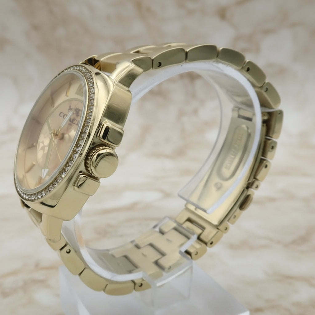 ساعة كوتش بوي فريند ذهبية من الفولاذ المقاوم للصدأ