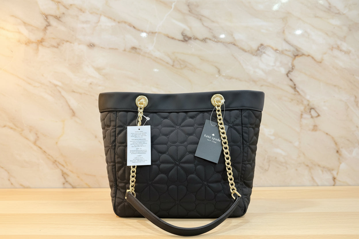 حقيبة كيت سبيد المبطنة والمزينة بالزهور - متوسطة الحجم - سوداء